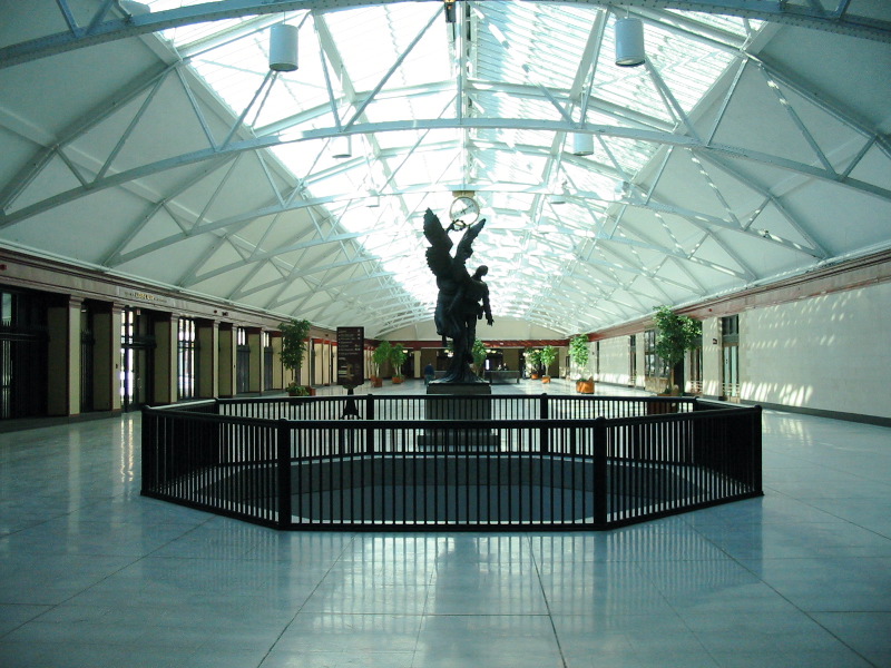 Called "Salle des pas perdus" (Translate as you will : Room of lost steps or Room of the ones not that are not lost). Look at the beautiful glass roof !